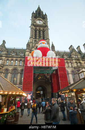 The Christmas market Manchester and the town hall, England, UK
