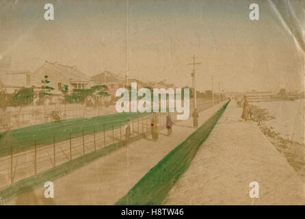 AJAXNETPHOTO. 1900-1905 (APPROX). KOBE, JAPAN. - HARBOUR PROMENADE PICTURED IN AN EARLY 20TH CENTURY HAND COLOURED BLACK AND WHITE ALBUMEN PRINT.  PHOTOGRAPHER:UNKNOWN  © DIGITAL IMAGE COPYRIGHT AJAX VINTAGE PICTURE LIBRARY  SOURCE: AJAX VINTAGE PICTURE LIBRARY COLLECTION  REF:161408 36 Stock Photo