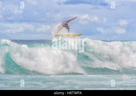 Surfer at Banzai Pipeline, North Shore Oahu Hawaii, waves on this day were 4-8 feet. Stock Photo