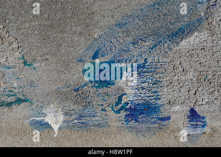 Abstract design with texture from spilled paint on concrete after repainting job Stock Photo