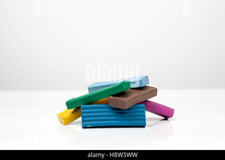 colorful plasticine blocks on white Stock Photo