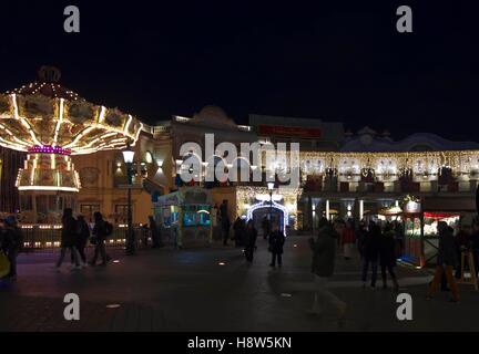 VIENNA, AUSTRIA - DECEMBER 31 2015: People at night at Prater amusement park in Vienna, Austria Stock Photo
