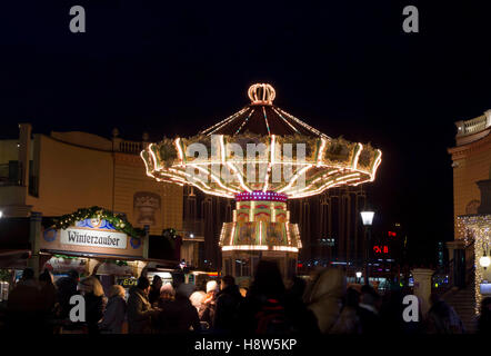 VIENNA, AUSTRIA - DECEMBER 31 2015: People at night at Prater amusement park in Vienna, Austria Stock Photo