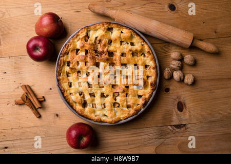 baked fresh apple pie on wooden table Stock Photo