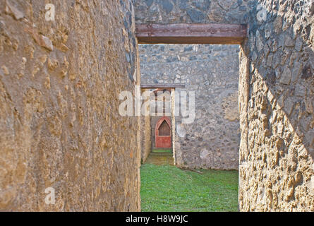 The preserved buildings in Pompeii archaeological site helps to discover the way of life in ancient Roman city, Italy. Stock Photo