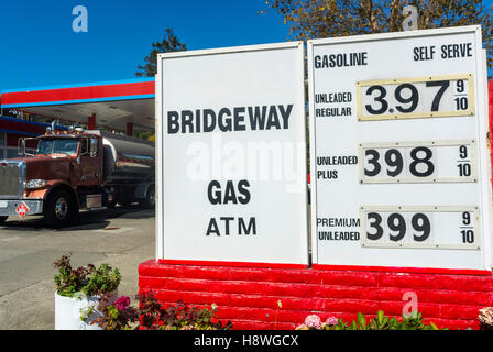 Sausalito, CA, USA, Detail Service Gas Station Sign with Prices on Display Outside, with Delivery Truck, San Francisco Suburb Stock Photo