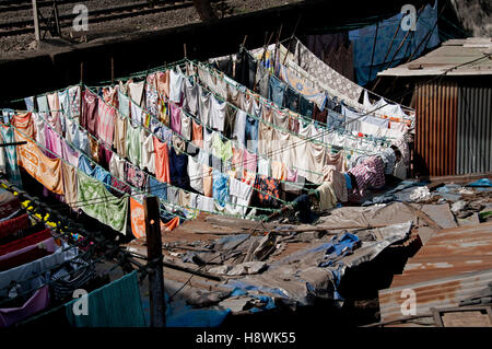 Dhobi ghat the outdoor laundry for all of Mumbai.  This show laundry drying after washing in one of the many courtyard for dryin Stock Photo