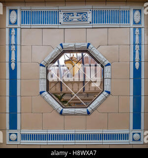 Decorative tiled panel on the wall of The Floral Hall, Winter Gardens, Blackpool, Lancashire, UK. Stock Photo