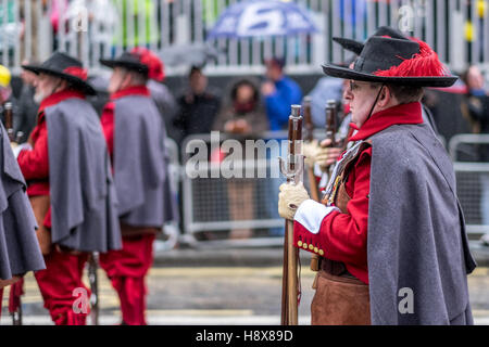 Men march in Lord Mayor's show in London, England November 2016.  Red stockings buckle shoes royalty royal soldier Stock Photo