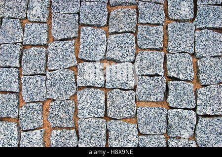 Granite Cobblestone Pavement Texture Background, Large Detailed Horizontal Stone Block Paving, Rough Cut Textured Grey Pattern Stock Photo