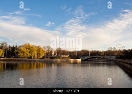 View of Svisloch river and a bridge over it in a central part of Minsk, a capital of Belarus. Stock Photo
