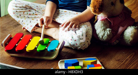 Kid Playing Xylophone Toy Enjoy Concept Stock Photo