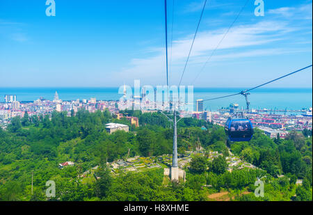 The ride on the cableway is one of the most popular and interesting tourist attractions in Batumi, Georgia. Stock Photo