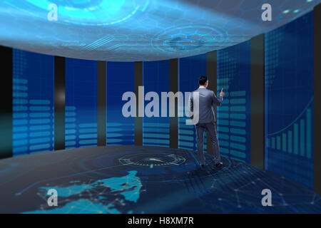 Businessman pressing virtual buttons in futuristic concept Stock Photo