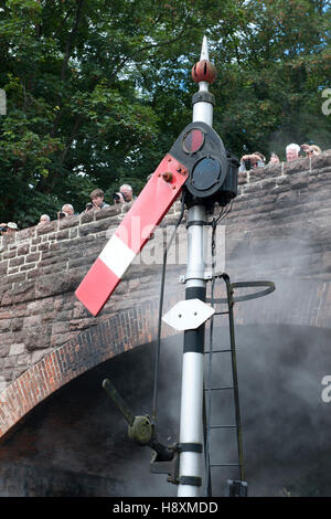 Lower quadrant semaphore starting signal at  on the West somerset Railway, UK Stock Photo