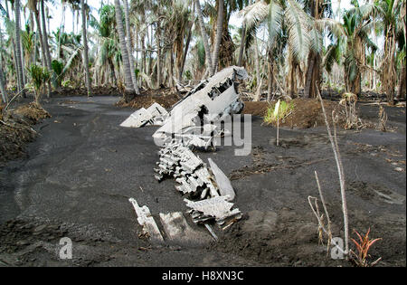 The wreckage of this WWII Japanese plane is buried in ash from the volcano Tavurvur near Rabaul, Papua New Guinea. Stock Photo
