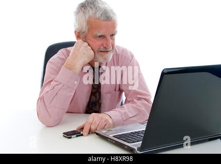 Senior citizen, 60+, working on a laptop Stock Photo