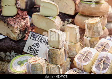 Typical cheese on sale during Alba White Truffle Fair in Alba, Italy Stock Photo