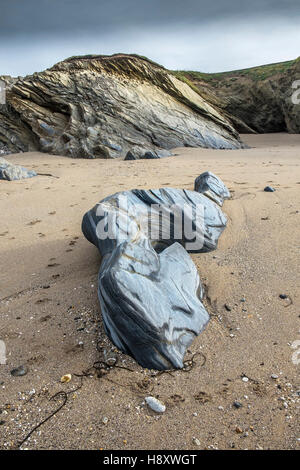 Rocks exposed at low tide on Little Fistral Beach in Newquay, Cornwall. Stock Photo