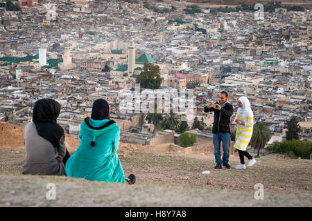 Couple taking selfies in the evening sun north of Fès Stock Photo