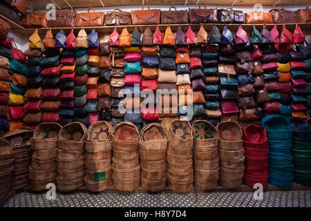 Leather bags in a cooperative shop. A sales room of the leather cooperative of Fès. In it the tanners have come together, to prevent dumping prices and imported leather Stock Photo