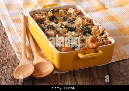 Strata casserole with spinach close up in baking dish. Horizontal Stock Photo