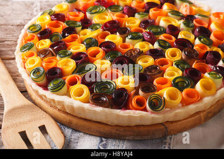 Beautiful colorful vegetable tart close-up on the table. horizontal Stock Photo