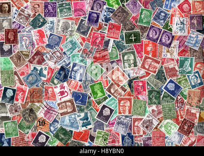 EUROPE - circa 1950-2000: Horizontal background of definitive European postage stamps, including stamps from Germany, the UK, Italy, France, the Nethe Stock Photo