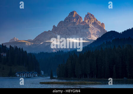 Tre Cime of the Dolomites tower over Lago Misurina, Belluno, Italy Stock Photo