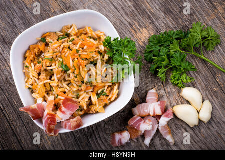 Ham with rice and assorted vegetables in natural light Stock Photo