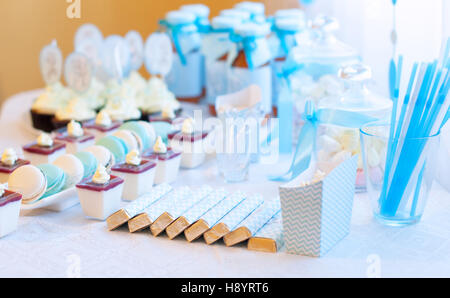 dessert table for a party. Cupcakes, sweetness and flowers Stock Photo