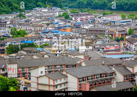 YANGSHUO, CHINA - JUNE 12: View over rooftops and buildings of Yangshuo city, Guilin prefecture. June 2016 Stock Photo