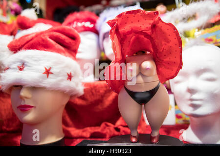 Hamburg, Germany. 17th Nov, 2016. An indecent figurine is sold at a stand at the 'Santa Pauli' Christmas market at Spielbudenplatz in Hamburg, Germany, 17 November 2016. The 'hottest' Christmarket on the Reeperbahn in Hamburg opened on Thursday. Photo: CHRISTIAN CHARISIUS/dpa/Alamy Live News Stock Photo