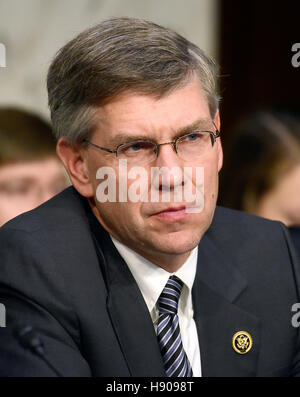Washington DC, USA. 17th Nov, 2016. United States Representative Erik Paulsen (Republican of Minnesota), listens as Janet L. Yellen, Chair, Board of Governors of the Federal Reserve System testifies before the US Congress Joint Economic Committee on 'The Stock Photo