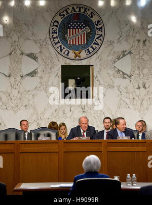Washington DC, USA. 17th Nov, 2016. United States Senator Dan Coats (Republican of Indiana), Chairman, US Congress Joint Economic Committee, listens as Janet L. Yellen, Chair, Board of Governors of the Federal Reserve System testifies before the committee Stock Photo