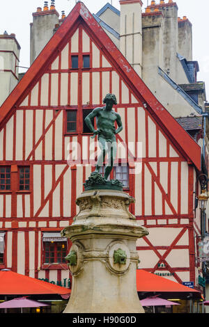 DIJON, FRANCE - OCTOBER 14, 2016: The Francois-Rude square and the wine maker statue, in Dijon, Burgundy, France Stock Photo