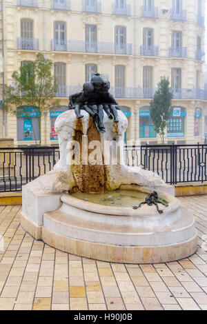 DIJON, FRANCE - OCTOBER 16, 2016: The youth fountain in the Darcy square, in Dijon, Burgundy, France Stock Photo