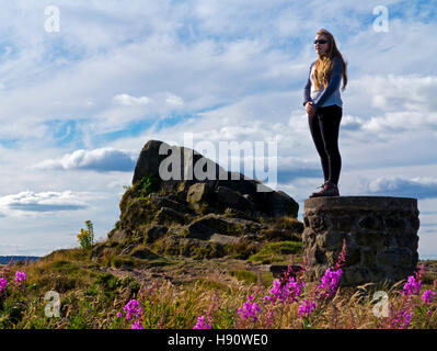 Teenage girl with long hair enjoying a country walk in summer Stock Photo