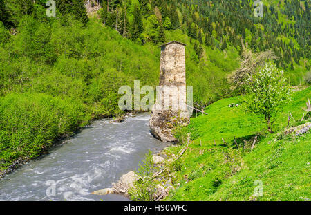 The preserved Love tower stands on the rock in the mountain river Enguri, Kala village, Samegrelo-Zemo Svaneti, Georgia. Stock Photo