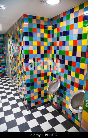 The brightly tiled mens toilet in The Scotish Modern Art Gallery, Edinburgh. Stock Photo