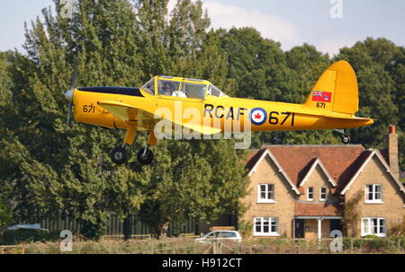 Shuttleworth Collection's DHC1 Chipmunk RCAF671 G-BNZC at an Air Show at Old Warden, UK Stock Photo