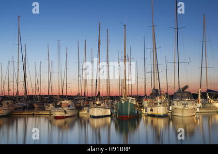 Sailboats in Port at Dusk Long Exposure Stock Photo