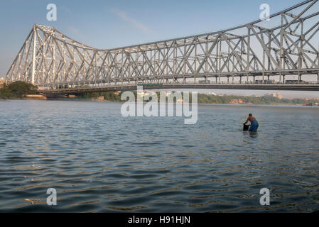 Historic Howrah bridge on the river Hooghly (Ganges) at Kolkata, India. Stock Photo