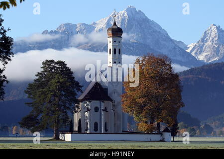 St.Coloman church in front of the Bavarian Alps Stock Photo