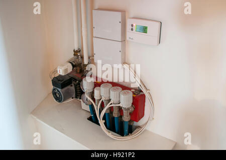 Controls for underfloor heating system. Stock Photo