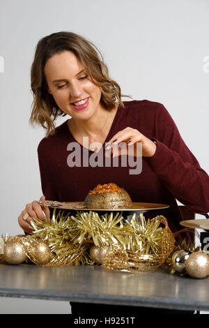 EDITORIAL USE ONLY Frances Quinn, winner of the Great British Bake Off 2013, unveils a selection of puddings to celebrate National Pudding Day &ETH; Friday November 18. Stock Photo