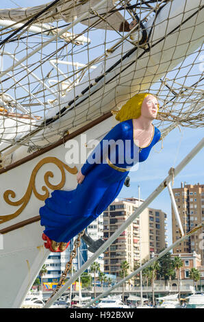 Figurehead, female, woman, full-length figure in blue dress. on Norwegian sailing ship Christian Radich in port of Malaga, Spain Stock Photo