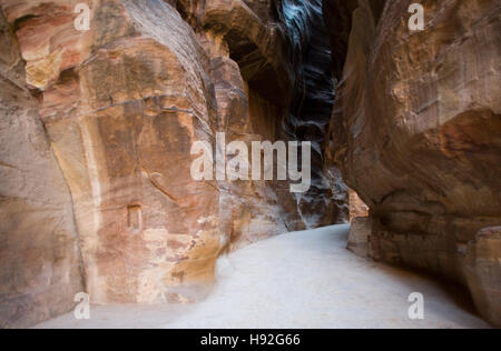 Petra canyon called the Siq that leads to the Nabatean city, Jordan Stock Photo