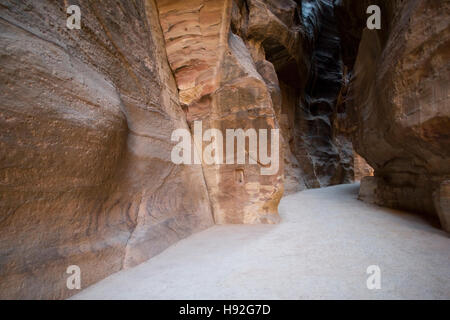 Petra canyon called the Siq that leads to the Nabatean city, Jordan Stock Photo