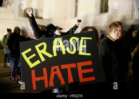 Indianapolis, Indiana, USA. 12th Nov, 2016. Anti-Trump protesters hold signs and march against United States president elect Donald Trump, and his running mate vice president elect Mike Pence. The protesters who ranged from muslims, Black Lives Matter activists, members of the LGBTQ community, women, immigrants and others, are angry about the policies proposed by Trump, and that he was not elected by the popular vote, but will be elected by the electoral college. Seven protesters were arrested during the march, and at one point police used rubber bullets and pepper balls against members of the Stock Photo